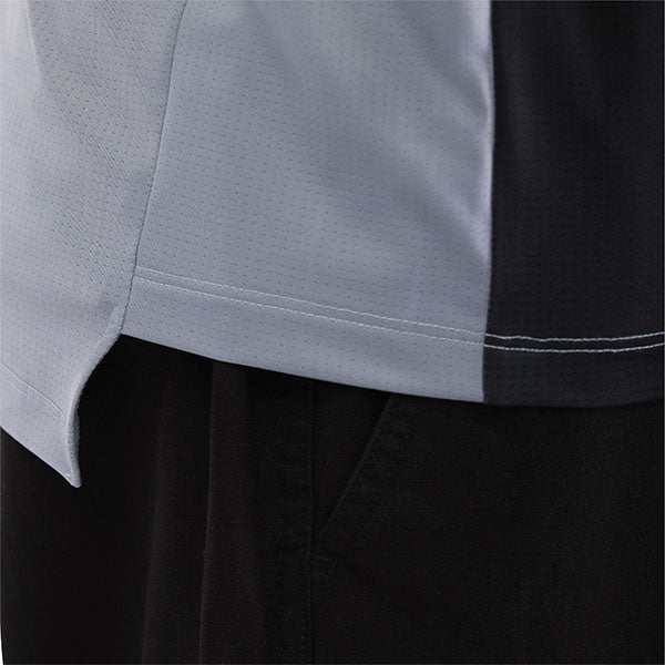 Rear view of Steel Grey Ranger Drive Jersey (SKU: 33538-172), showing extended tail and ventilation