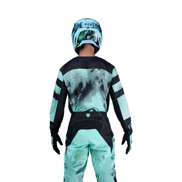 Flat lay of turquoise 180 Kairos Jersey showing full-length construction and graphic detailing, SKU 36313-295 | SKU: 36313-29 | Available at BTO Sports