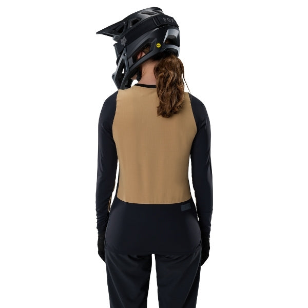 Fox Racing Defend Thermal Jersey (MTB) (Womens) in Black, front product view, with the crew neck, long sleeves, large Fox chest graphic, contrasting arm panels, and curved drop-tail hem. Available options—Color: Brown Sugar, Black; Size: XS, SM, MD, LG, XL. SKU 33787-001-XS. UPC 191972931505.