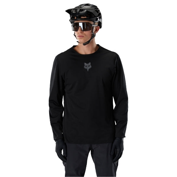 Fox Racing Flexair Water Pullover (MTB) in Black, full modeled front view, with the round neck, long sleeves, small Fox chest logo, side seams, and curved hem. Available options—Color: Black; Size: SM, MD, LG, XL, 2X.