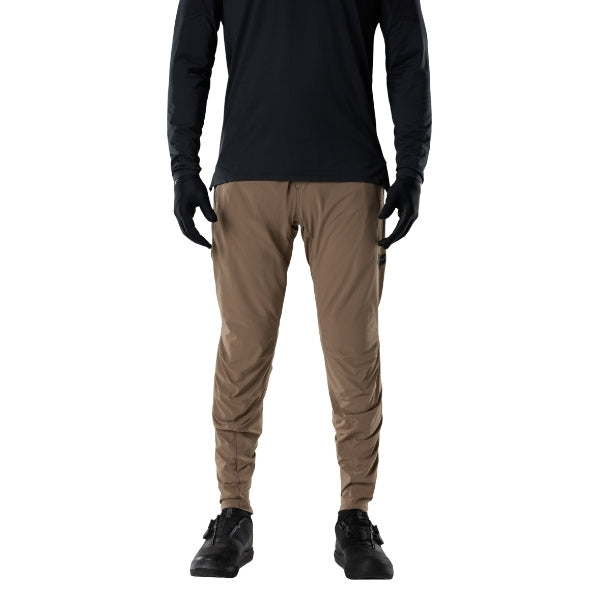Fox Racing Flexair Fire Pants (MTB) in Nutmeg, rear lower-leg and cuff view, with the reinforced seat, rear yoke, articulated knees, tapered legs, and lower-leg graphics. Available options—Color: Black, Nutmeg, Galaxy Blue; Size: 28, 30, 32, 34, 36, 38, 40. SKU 40142-512-38. UPC 198571117668.