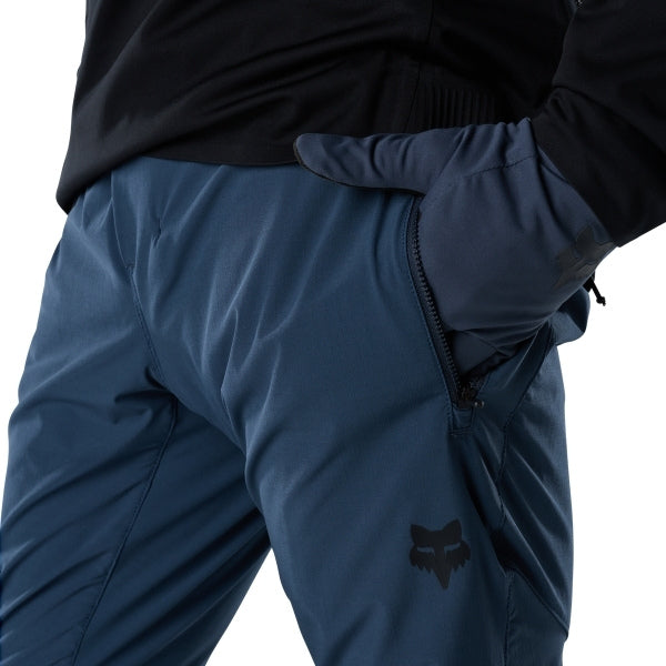 Fox Racing Flexair Fire Pants (MTB) in Galaxy Blue, close-up of the ratcheting waist closure, with the ratcheting waist adjuster, stretch yoke, shaped hip panel, and reinforced knee or thigh material. Available options—Color: Black, Nutmeg, Galaxy Blue; Size: 28, 30, 32, 34, 36, 38, 40. SKU 40142-D17-34. UPC 198571113417.