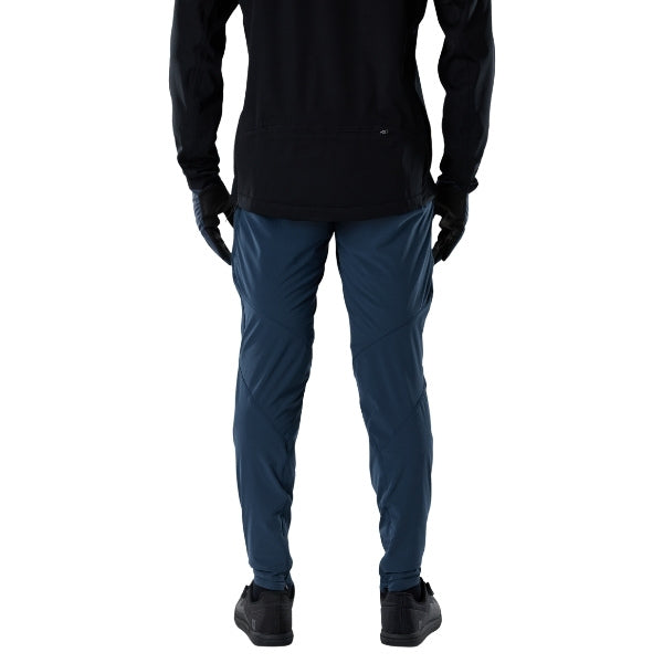 Fox Racing Flexair Fire Pants (MTB) in Galaxy Blue, rear lower-leg and cuff view, with the reinforced seat, rear yoke, articulated knees, tapered legs, and lower-leg graphics. Available options—Color: Black, Nutmeg, Galaxy Blue; Size: 28, 30, 32, 34, 36, 38, 40. SKU 40142-D17-38. UPC 198571113431.