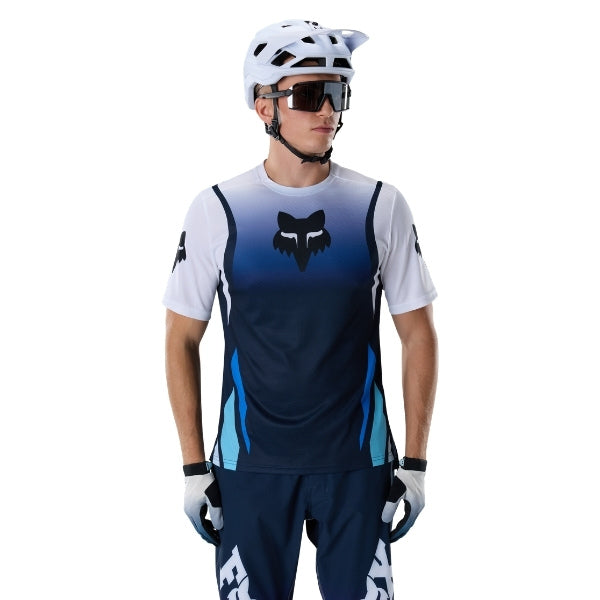 Fox Racing Ranger Foundry Jersey (MTB) in Midnight, close-up of the sleeve graphic and cuff, with the printed Fox artwork, mesh-knit texture, reinforced seam lines, and shaped cuff or hem. Available options—Color: Midnight, Sage; Size: SM, MD, LG, XL, 2X. SKU 40164-329-2X. UPC 198571116821.