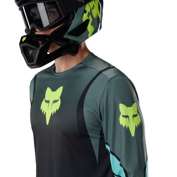 Fox Racing Ranger Foundry Long Sleeve Jersey (MTB) in Sage, close-up of the chest and shoulder panels, with the printed Fox artwork, mesh-knit texture, reinforced seam lines, and shaped cuff or hem. Available options—Color: Midnight, Sage; Size: SM, MD, LG, XL, 2X. SKU 40166-221-XL. UPC 198571120323.