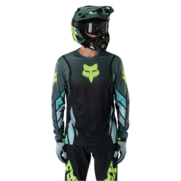 Fox Racing Ranger Foundry Long Sleeve Jersey (MTB) in Sage, close-up of the lower hem and drop-tail panel, with the printed Fox artwork, mesh-knit texture, reinforced seam lines, and shaped cuff or hem. Available options—Color: Midnight, Sage; Size: SM, MD, LG, XL, 2X.