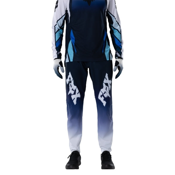 Fox Racing Ranger Foundry Pants (MTB) in Midnight, rear lower-leg and cuff view, with the reinforced seat, rear yoke, articulated knees, tapered legs, and lower-leg graphics. Available options—Color: Midnight, Sage; Size: 28, 30, 32, 34, 36, 38, 40. SKU 40174-329-38. UPC 198571116937.