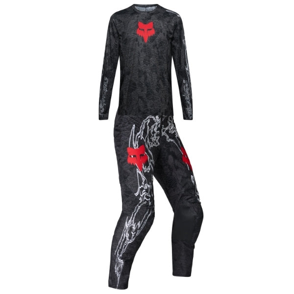 Fox Racing 180 Abyss Jersey, Pant Combo in Black, studio layout of the jersey and matching riding pants, with the long-sleeve jersey above coordinated pants, matching Fox graphics, articulated knees, and contrasting leg panels. Available option—Color: Black.