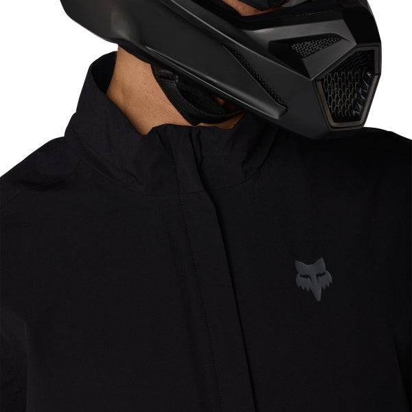Fox Racing Ranger OR Packable Rain Jacket in Black, alternate-color front product view, with the high collar or hood, full front zipper, zippered pockets, adjustable cuffs, shaped rear hem, and Fox chest logo. Available options—Color: Black, Ivy; Size: SM, MD, LG, XL, 2X, 3X. SKU 38699-001-L. UPC 198571062968.
