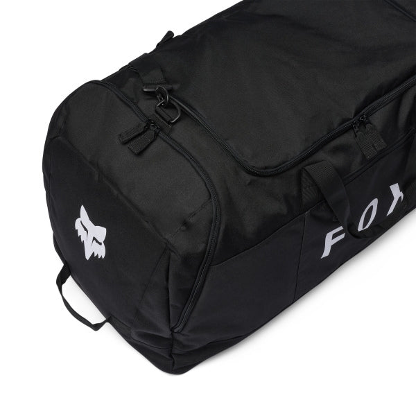 Fox Racing Podium Duffle in Blue Jewel, long-side view, with the main zippered compartment, reinforced base, carry handles, end pocket, wheels, and large Fox logo. Available options—Color: Black, Red, Blue Jewel. SKU 39031-364-OS. UPC 198571124208.