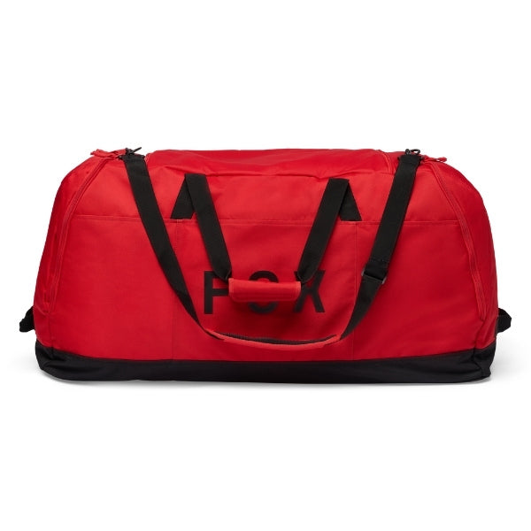 Fox Racing Podium Duffle in Blue Jewel, end-panel and carry-handle view, with the main zippered compartment, reinforced base, carry handles, end pocket, wheels, and large Fox logo. Available options—Color: Black, Red, Blue Jewel.