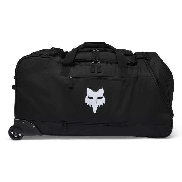 Fox Racing Shuttle Roller Bag in Black, long-side view, with the main zippered compartment, reinforced base, carry handles, end pocket, wheels, and large Fox logo. Available options—Color: Black, Pewter, Midnight. SKU 40539-001-OS. UPC 198571122525.
