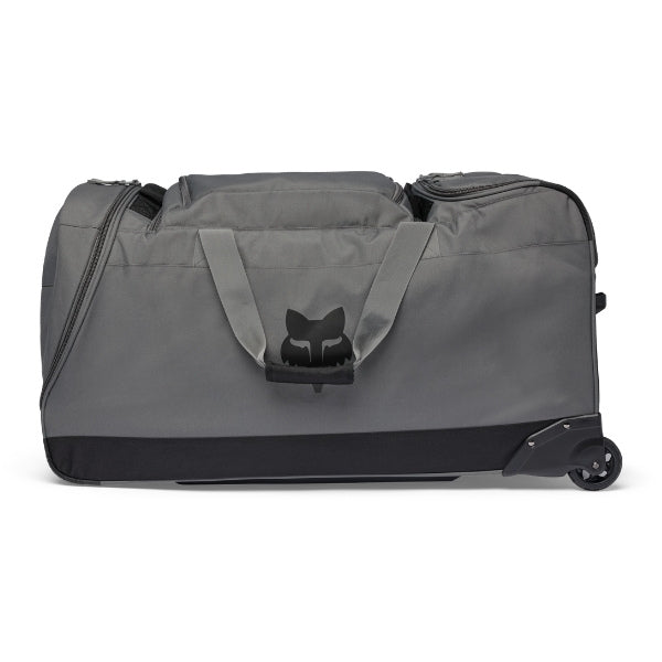 Fox Racing Shuttle Roller Bag in Midnight, end-panel and carry-handle view, with the main zippered compartment, reinforced base, carry handles, end pocket, wheels, and large Fox logo. Available options—Color: Black, Pewter, Midnight.