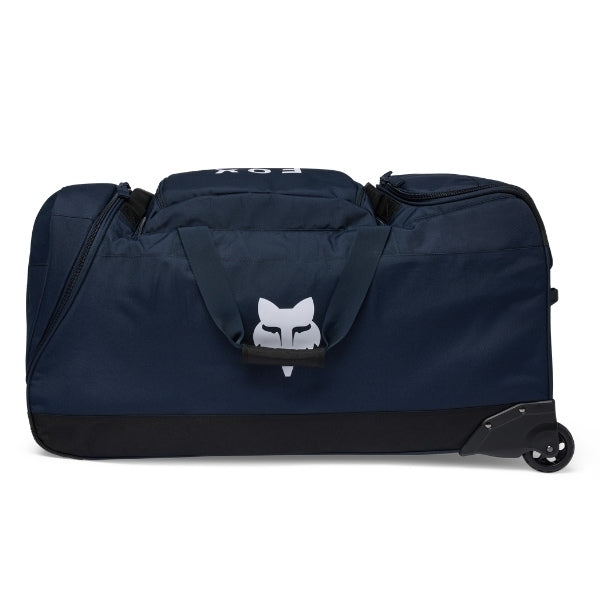 Fox Racing Shuttle Roller Bag in Midnight, end-panel and carry-handle view, with the main zippered compartment, reinforced base, carry handles, end pocket, wheels, and large Fox logo. Available options—Color: Black, Pewter, Midnight.