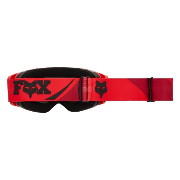 Fox Racing Vue Arc Vivid Goggles in Chili, side view of the frame and strap attachment, with the wide elastic strap, silicone grip bands, woven Fox lettering, and rear frame edge. Available options—Color: Yellow, Ice Blue, Chili.