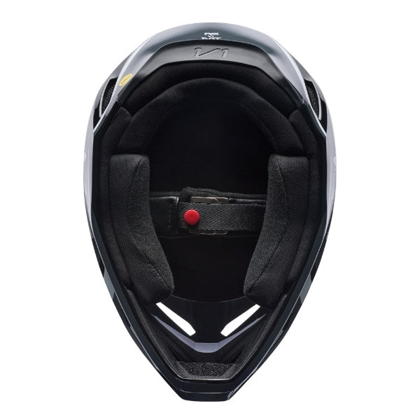 Fox Racing V1 Frame Helmet in Black, underside view of the interior padding and chin opening, with the padded crown liner, cheek pads, chin opening, and retention-strap area exposed. Available options—Color: Black, Blue, Grey/Yellow, Neon Pink, Red; Size: XS, SM, MD, LG, XL, 2X. SKU 40615-001-2X. UPC 198571121702.