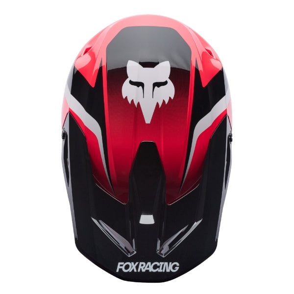 Fox Racing V1 Frame Helmet in Neon Pink, top view, with the visor tip, crown vents, shell graphics, and central Fox logo. Available options—Color: Black, Blue, Grey/Yellow, Neon Pink, Red; Size: XS, SM, MD, LG, XL, 2X. SKU 40615-065-XL. UPC 198571127926.