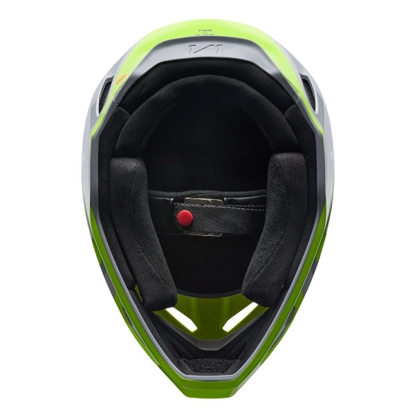 Fox Racing V1 Frame Helmet in Grey/Yellow, underside view of the interior padding and chin opening, with the padded crown liner, cheek pads, chin opening, and retention-strap area exposed. Available options—Color: Black, Blue, Grey/Yellow, Neon Pink, Red; Size: XS, SM, MD, LG, XL, 2X. SKU 40615-086-2X. UPC 198571125946.