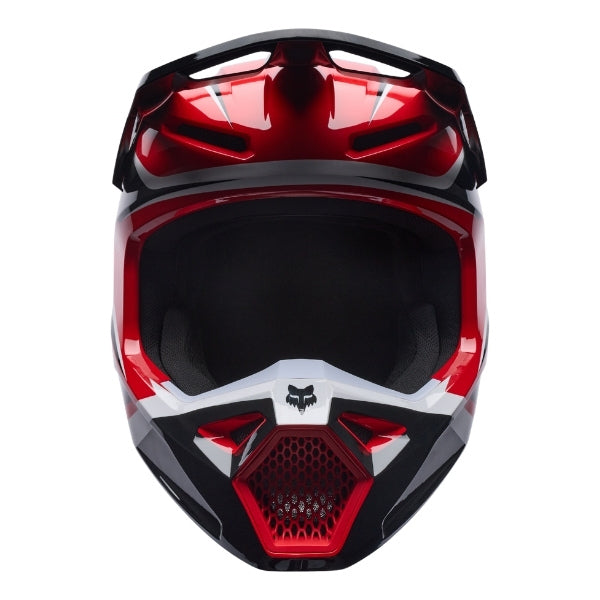 Fox Racing V1 Frame Helmet (Youth) in Red, left-side profile, with the extended visor, open face port, angular chin bar, side vents, and Fox graphics. Available options—Color: Black, Neon Pink, Blue, Grey/Yellow, Red; Size: Y-SM, Y-MD, Y-LG.