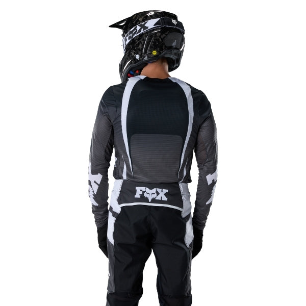 Fox Racing Flexair Thorn Jersey in Purple Lava, front product view, with the crew neck, long sleeves, large Fox chest graphic, contrasting arm panels, and curved drop-tail hem. Available options—Color: Black/White, Purple Lava, Red; Size: SM, MD, LG, XL, 2X. SKU 40658-E07-S. UPC 198571129340.