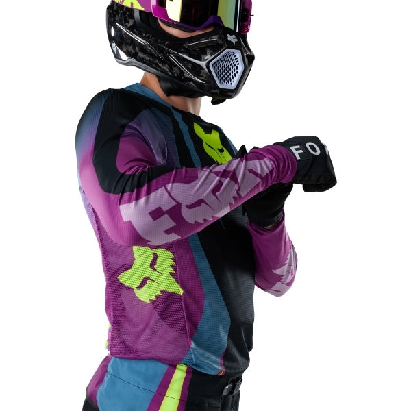Fox Racing Flexair Thorn Jersey in Purple Lava, close-up of the sleeve graphic and cuff, with the printed Fox artwork, mesh-knit texture, reinforced seam lines, and shaped cuff or hem. Available options—Color: Black/White, Purple Lava, Red; Size: SM, MD, LG, XL, 2X. SKU 40658-E07-2X. UPC 198571129388.