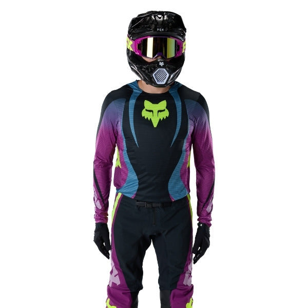 Fox Racing Flexair Thorn Jersey in Red, front product view, with the crew neck, long sleeves, large Fox chest graphic, contrasting arm panels, and curved drop-tail hem. Available options—Color: Black/White, Purple Lava, Red; Size: SM, MD, LG, XL, 2X. SKU 40658-003-S. UPC 198571130179.