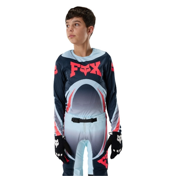 Fox Racing Flexair Arc Jersey (Youth) in Chili, front product view, with the crew neck, long sleeves, large Fox chest graphic, contrasting arm panels, and curved drop-tail hem. Available options—Color: Ice Blue, Chili; Size: Y-SM, Y-MD, Y-LG, Y-XL. SKU 40671-555-YS. UPC 198571124512.