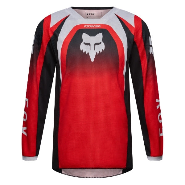 Fox Racing 180 Frame Jersey (Youth) in Red, close-up of the chest and shoulder panels, with the printed Fox artwork, mesh-knit texture, reinforced seam lines, and shaped cuff or hem. Available options—Color: Blue, Grey/Yellow, Black, Red; Size: Y-SM, Y-MD, Y-LG, Y-XL. SKU 40672-003-YXL. UPC 198571130018.