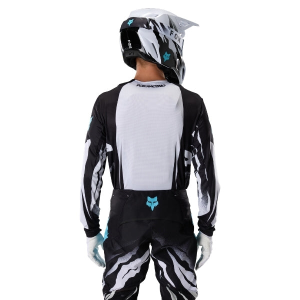 Fox Racing 360 Clutch Jersey in Neon Pink, front product view, with the crew neck, long sleeves, large Fox chest graphic, contrasting arm panels, and curved drop-tail hem. Available options—Color: White/Black, Neon Pink; Size: SM, MD, LG, XL, 2X. SKU 40678-065-S. UPC 198571127971.