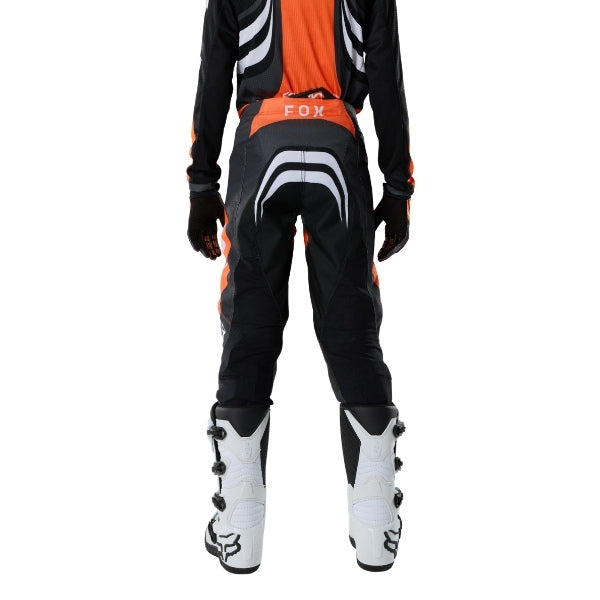 Fox Racing 180 Draft Pants (Youth) in Sunburst, full modeled rear view, with the reinforced seat, rear yoke, articulated knees, tapered legs, and lower-leg graphics. Available options—Color: White, Sunburst; Size: Y-22, Y-24, Y-26, Y-28.