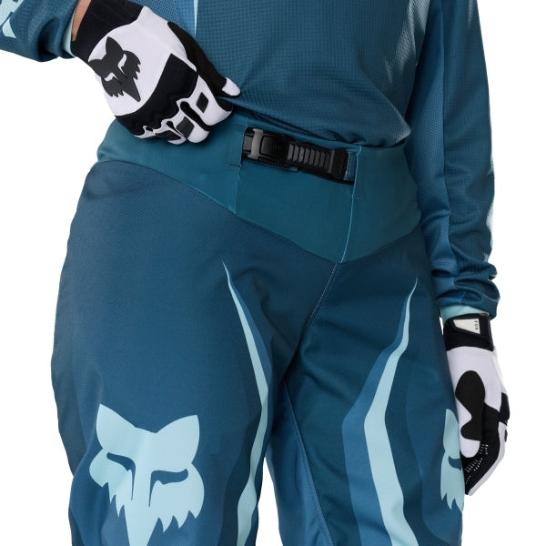 Fox Racing 180 Frame Pants (Womens) in Deep Blue, front product view, with the adjustable waist, articulated knees, contrasting leg graphics, reinforced inner knees, and tapered cuffs. Available options—Color: Neon Pink, Deep Blue; Size: 2, 4, 6, 8, 10, 12, 14, 16. SKU 40699-E19-2. UPC 198571124840.