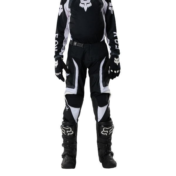 Fox Racing 180 Frame Pants (Youth) in Red, close-up of the side thigh and knee panels, with the ratcheting waist adjuster, stretch yoke, shaped hip panel, and reinforced knee or thigh material. Available options—Color: Blue, Grey/Yellow, Black, Red; Size: Y-22, Y-24, Y-26, Y-28.