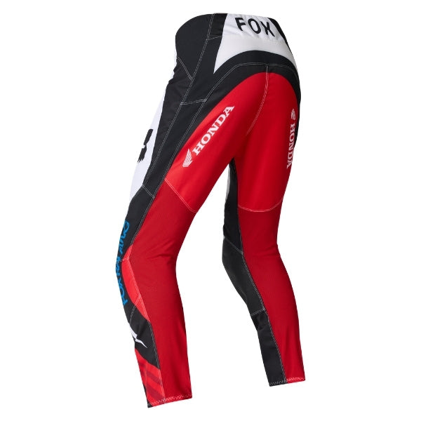 Fox Racing 180 Honda Pants in White/Red, rear product view, with the reinforced seat, rear yoke, articulated knees, tapered legs, and lower-leg graphics. Available options—Color: White/Red; Size: 26, 28, 30, 32, 34, 36, 38. SKU 40708-077-28. UPC 198571132784.