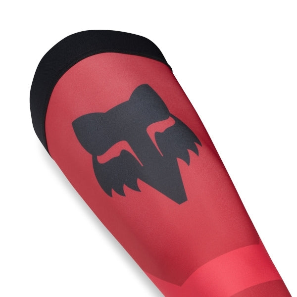 Fox Racing Flexair Knee Brace Socks in Grey, close-up of the reinforced heel and ankle, with the ribbed cuff, knitted Fox graphics, shaped heel, reinforced toe, and ventilated stretch knit. Available options—Color: Black, Blue, Red, Grey; Size: MD, LG.