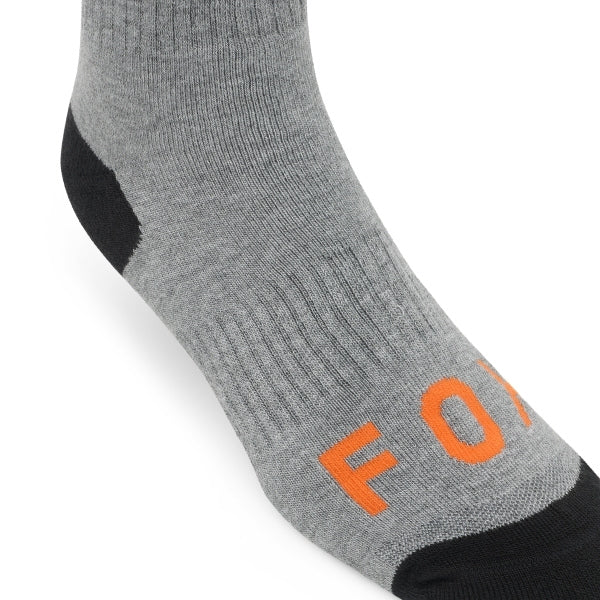 Fox Racing 180 Elevated Core Socks in Grey, rear calf graphic view, with the ribbed cuff, knitted Fox graphics, shaped heel, reinforced toe, and ventilated stretch knit. Available options—Color: Black, Midnight, Red, Grey; Size: SM, MD, LG. SKU 40716-006-M. UPC 198571125861.
