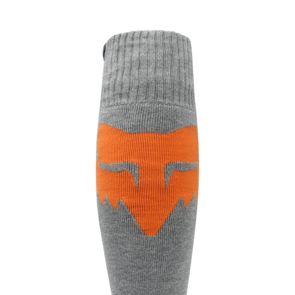 Fox Racing 180 Elevated Core Socks in Grey, close-up of the ribbed foot and toe, with the ribbed cuff, knitted Fox graphics, shaped heel, reinforced toe, and ventilated stretch knit. Available options—Color: Black, Midnight, Red, Grey; Size: SM, MD, LG. SKU 40716-006-L. UPC 198571125878.