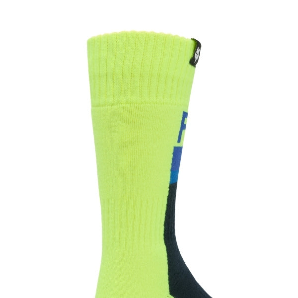 Fox Racing 180 Core Socks (Youth) in HiViz Yellow, close-up of the calf logo and knit texture, with the ribbed cuff, knitted Fox graphics, shaped heel, reinforced toe, and ventilated stretch knit. Available options—Color: Orange, HiViz Yellow; Size: Y-SM, Y-LG.