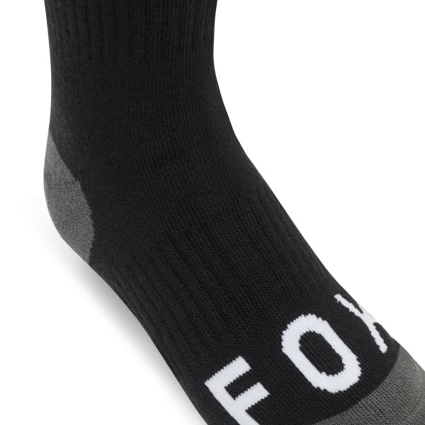 Fox Racing 180 Elevated Core Socks (Youth) in Red, full side profile, with the ribbed cuff, knitted Fox graphics, shaped heel, reinforced toe, and ventilated stretch knit. Available options—Color: Black, Red; Size: Y-SM, Y-LG. SKU 40719-003-YS. UPC 198571129951.