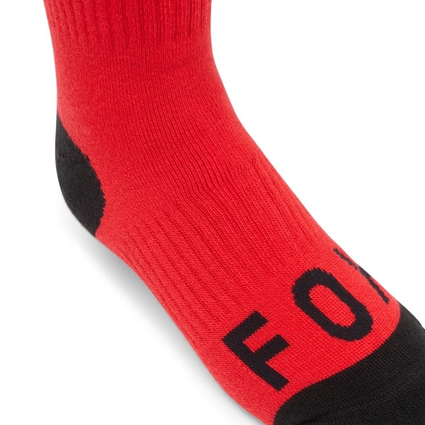 Fox Racing 180 Elevated Core Socks (Youth) in Red, full side profile, with the ribbed cuff, knitted Fox graphics, shaped heel, reinforced toe, and ventilated stretch knit. Available options—Color: Black, Red; Size: Y-SM, Y-LG.