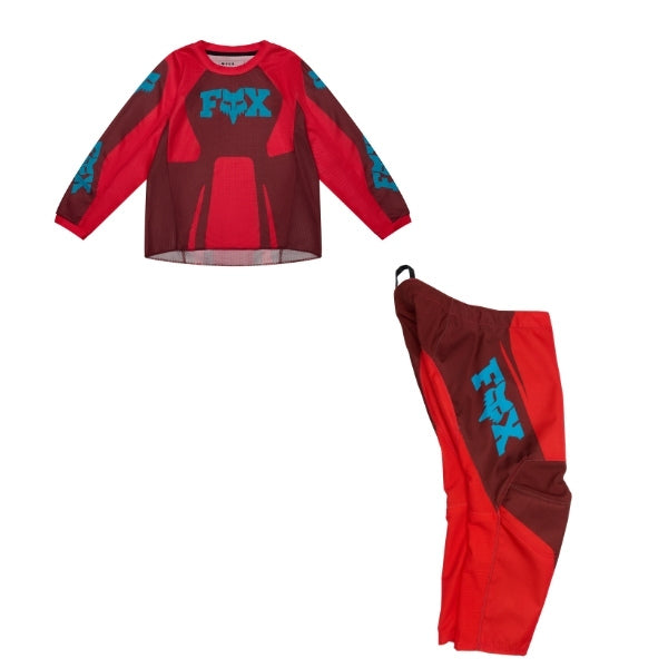 Fox Racing 180 Raid Jersey, Pant Combo (Kids) in Rust, studio layout of the jersey and matching riding pants, with the long-sleeve jersey above coordinated pants, matching Fox graphics, articulated knees, and contrasting leg panels. Available options—Color: Rust, Purple Lava.
