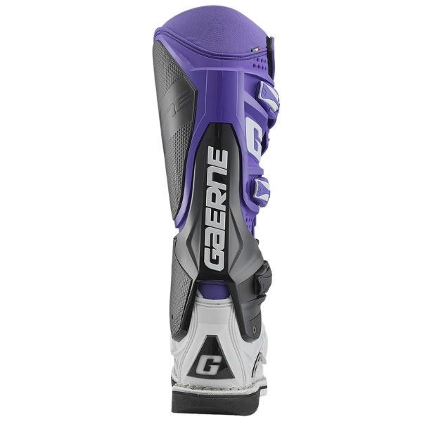 Professional studio photo of Gaerne, SG-12 LE Boots, Product image of Gaerne MX25 480 570 SG12 LE Boots PurBlkWht 3 motocross boots showing design and colorway, rear view, Colors: Purple/Black/White, Sizes: 8–13, SKU 480-570