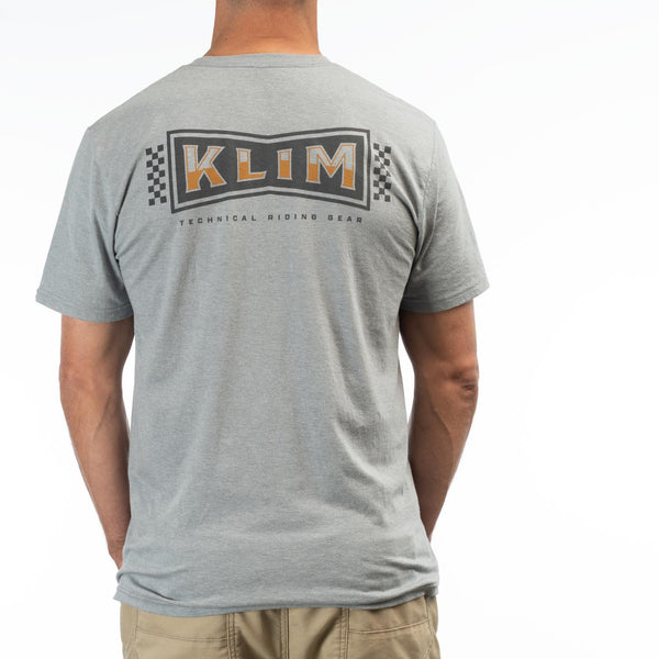 Professional studio photo of Klim Pinned Tri-Blend Tee; showing tee fit, printed graphics, and crew neckline; SKU 3693-000-120-222; Sizes: S-3XL