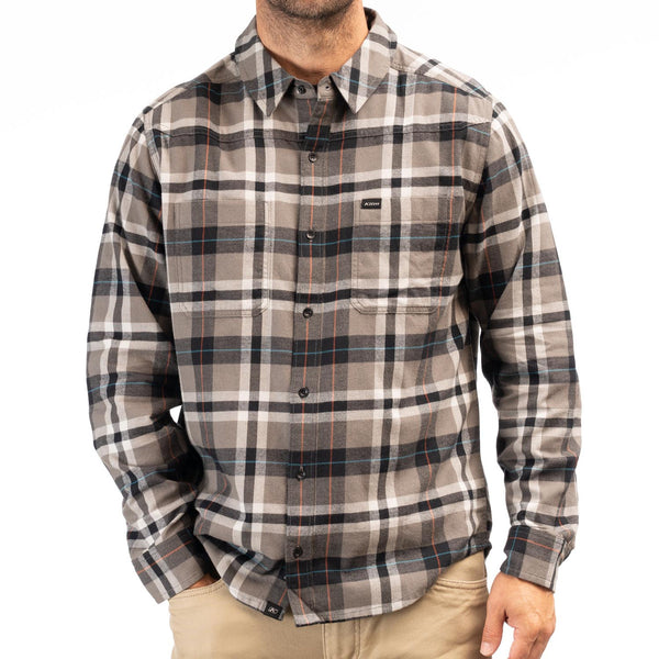 Crisp studio image on a white background of Klim; showing flannel shirt fit, button front, and plaid pattern; SKU 3632-000-130-657