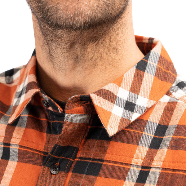 Crisp studio image on a white background of Klim; showing flannel shirt fit, button front, and plaid pattern; SKU 3632-000-150-408
