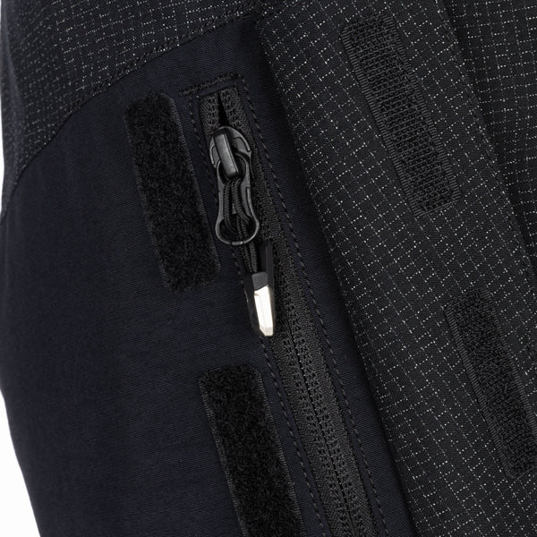 Studio photo on a white background of Klim Badlands Pro A3 Pants; showing panel layout, seams, and overall cut; SKU 4102-002-030-000