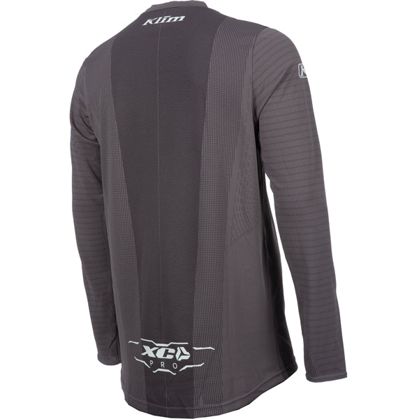 Professional studio photo of Klim XC Pro Jersey; showing fabric texture, panel layout, and graphics; SKU 5020-001-120-359; Sizes: S-3XL