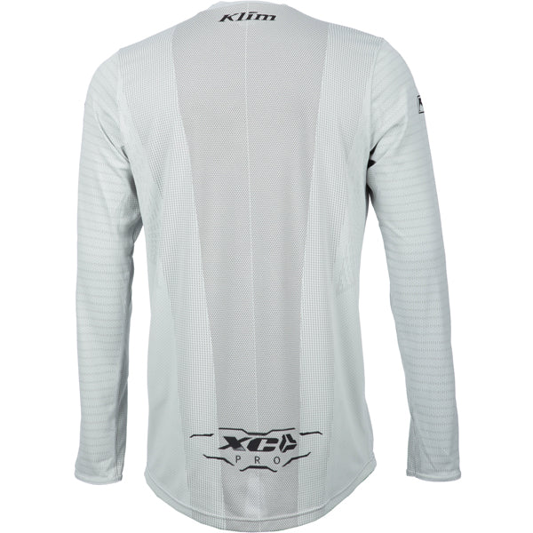 Crisp studio image on a white background of Klim XC Pro Jersey; showing fabric texture, panel layout, and graphics; SKU 5020-001-120-359; Sizes: S-3XL