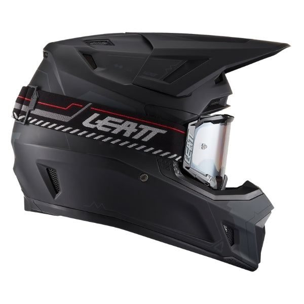 Leatt Moto 7.5 Cardo motocross helmet kit in Stealth Black, right-side profile showing the peak and chin guard with included goggles