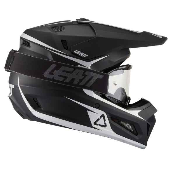 Leatt Moto 3.5 motocross helmet kit in Black, right-side profile showing the peak and chin guard with included goggles