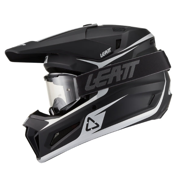 Leatt Moto 3.5 Youth motocross helmet kit in Black, left-side profile showing the shell graphics and included goggles